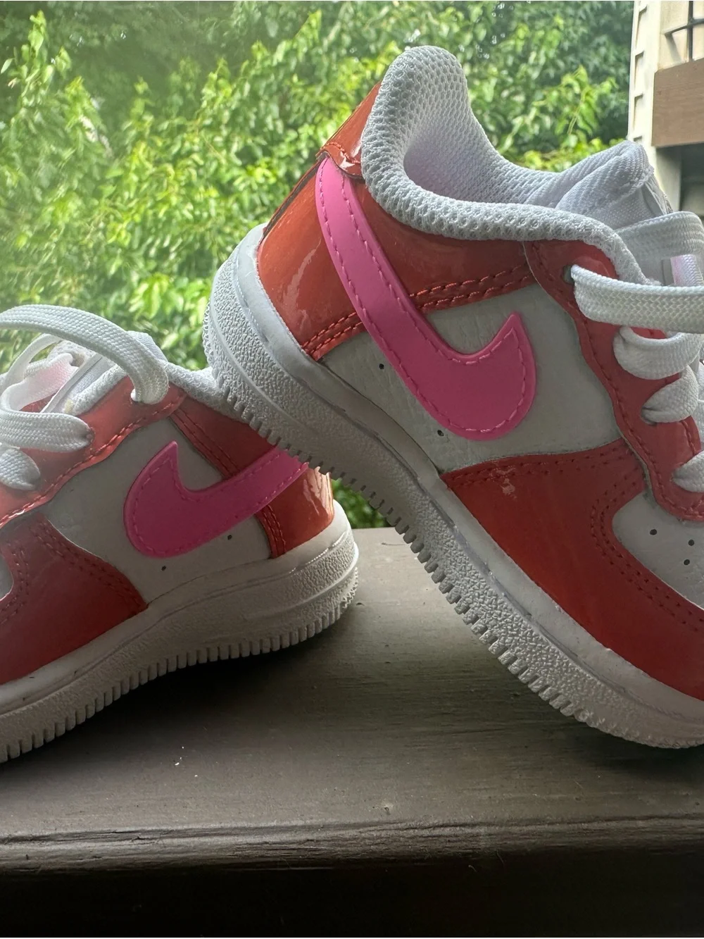 Nike Kids White Sneakers with Pink Swoosh and Orange Panels